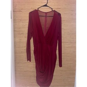 Woman’s wine dress with sheer sleeves